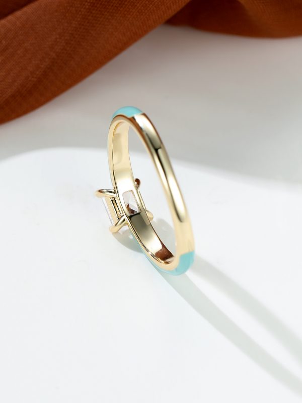 خاتم نسائي أنيق بزركون أزرق بتصميم عتيق وإطار ذهبي