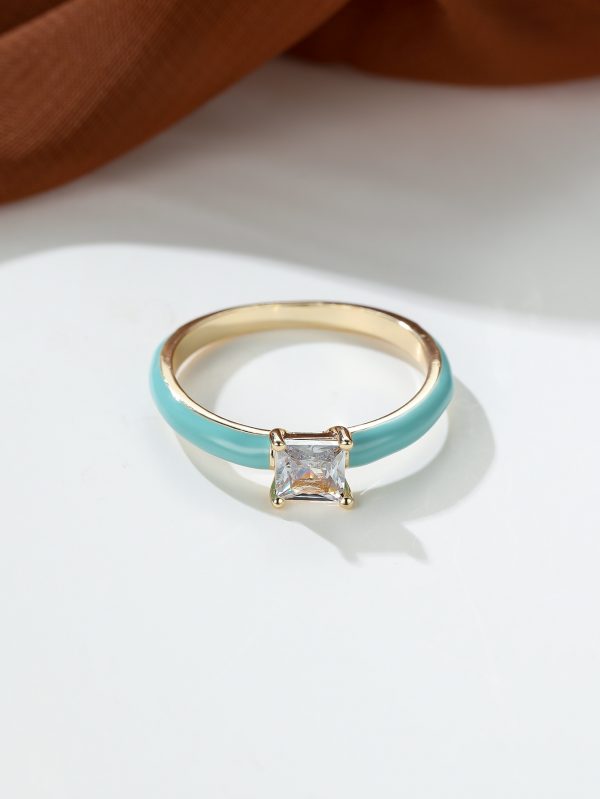 خاتم نسائي أنيق بزركون أزرق بتصميم عتيق وإطار ذهبي