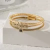 Stainless Steel and Zircon Twisted Wire Interlocking Open Bracelet Bangle Fashion Jewelry