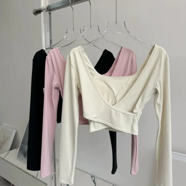 منصات الصدر الثابتة عبرت الظهر ملابس اليوغا ضيقة التخسيس الرياضة بأكمام طويلة تشغيل بولا اللياقة البدنية الملابس بلايز قمصان