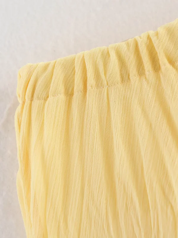 تنورة YENKYE للسيدات مجعدة على شكل حرف a ميدي باللون الأصفر والزبدة بخصر مطاطي تنانير أنيقة لعطلات الربيع والصيف جديدة 2025 faldas mujer