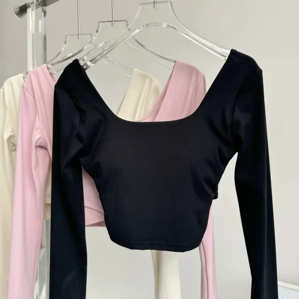 منصات الصدر الثابتة عبرت الظهر ملابس اليوغا ضيقة التخسيس الرياضة بأكمام طويلة تشغيل بولا اللياقة البدنية الملابس بلايز قمصان