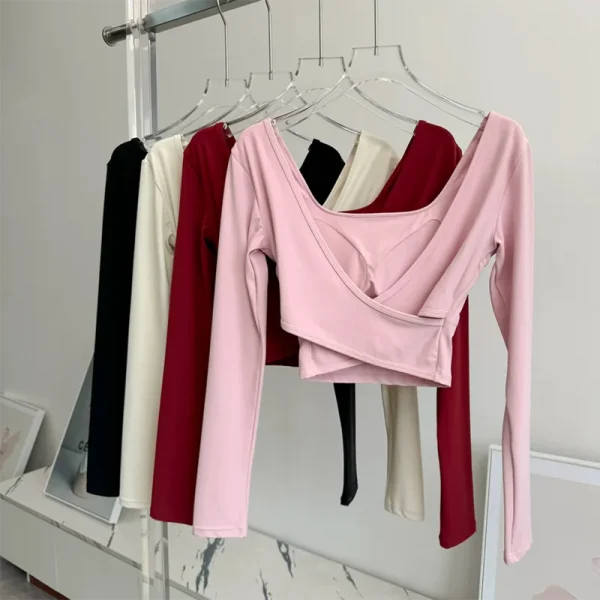 منصات الصدر الثابتة عبرت الظهر ملابس اليوغا ضيقة التخسيس الرياضة بأكمام طويلة تشغيل بولا اللياقة البدنية الملابس بلايز قمصان