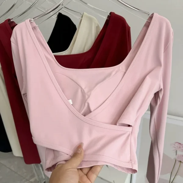 منصات الصدر الثابتة عبرت الظهر ملابس اليوغا ضيقة التخسيس الرياضة بأكمام طويلة تشغيل بولا اللياقة البدنية الملابس بلايز قمصان