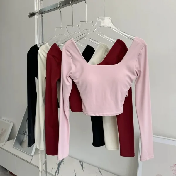 منصات الصدر الثابتة عبرت الظهر ملابس اليوغا ضيقة التخسيس الرياضة بأكمام طويلة تشغيل بولا اللياقة البدنية الملابس بلايز قمصان