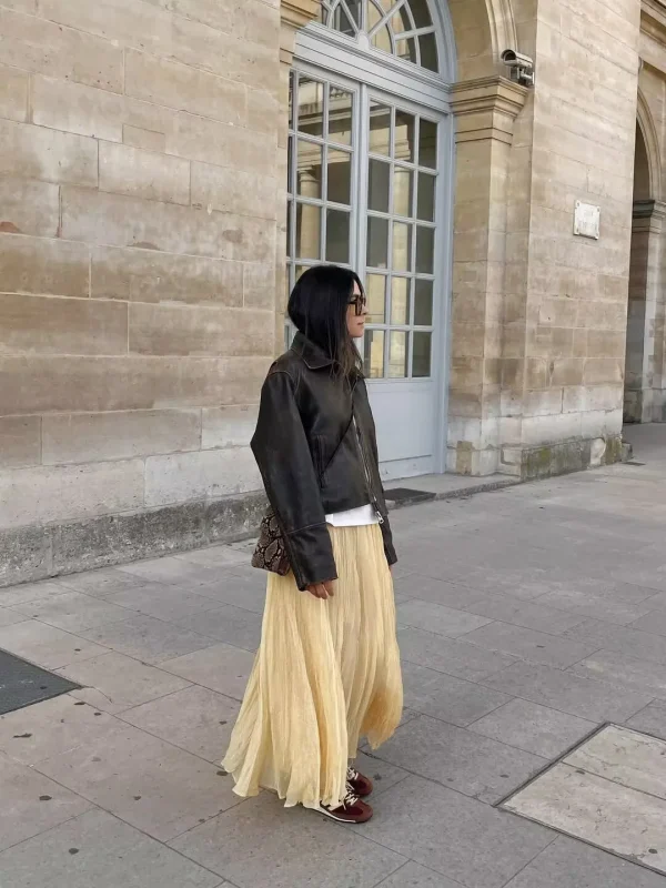 تنورة YENKYE للسيدات مجعدة على شكل حرف a ميدي باللون الأصفر والزبدة بخصر مطاطي تنانير أنيقة لعطلات الربيع والصيف جديدة 2025 faldas mujer