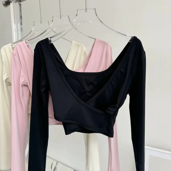 منصات الصدر الثابتة عبرت الظهر ملابس اليوغا ضيقة التخسيس الرياضة بأكمام طويلة تشغيل بولا اللياقة البدنية الملابس بلايز قمصان