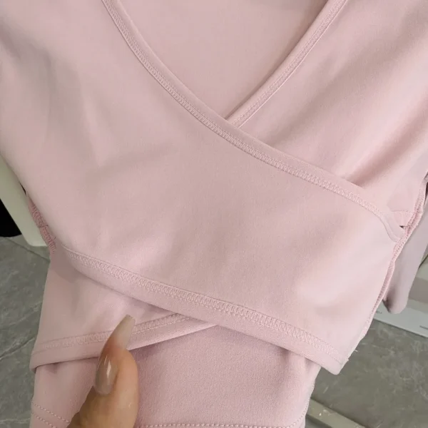 منصات الصدر الثابتة عبرت الظهر ملابس اليوغا ضيقة التخسيس الرياضة بأكمام طويلة تشغيل بولا اللياقة البدنية الملابس بلايز قمصان